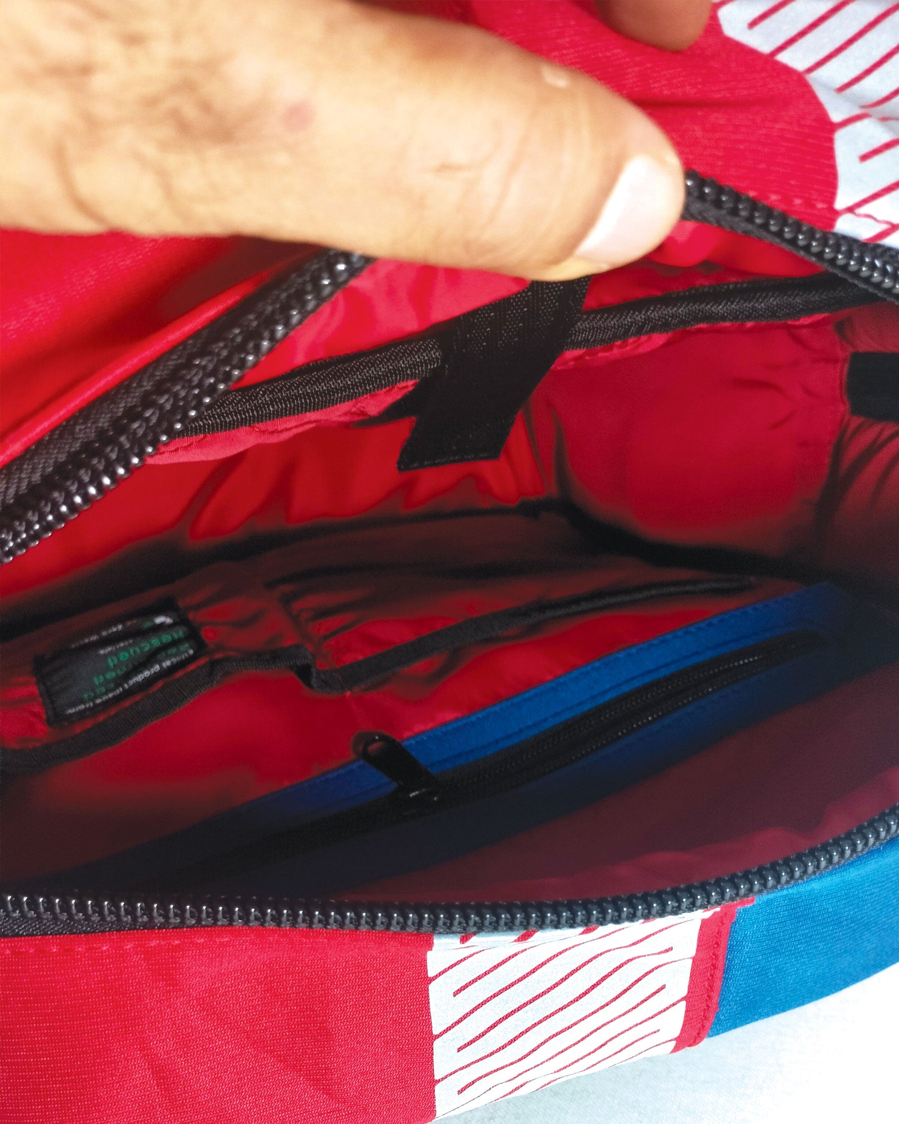 Stealth Backpack in Red and Blue Hi-Vis Safety Jackets with Car Seat Buckle