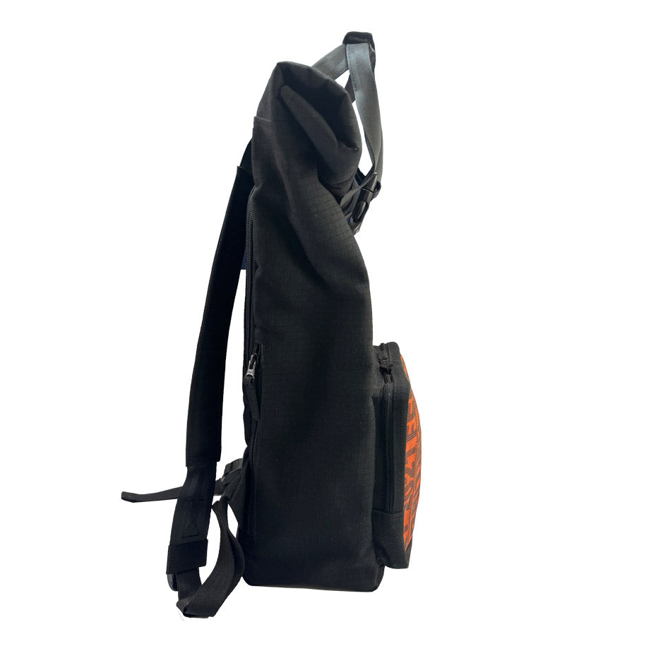 Serially Circular Benji Roll Top Backpack in Ex-British Cargo Belts